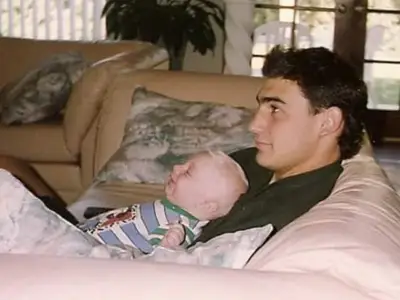 After his father died in the hospital, a nurse held him in his arms