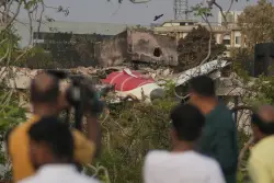 Death toll from plane crash in India climbs to 270 as search teams find more bodies