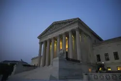 Supreme Court blocks rule that blocks Voting Rights Act for now