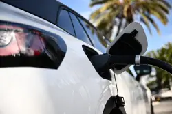 After a freeze, Trump administration reluctantly agrees to fund EV chargers
