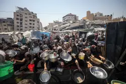 What does it take for a famine to be declared in Gaza?