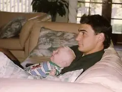 After his father died in the hospital, a nurse held him in his arms